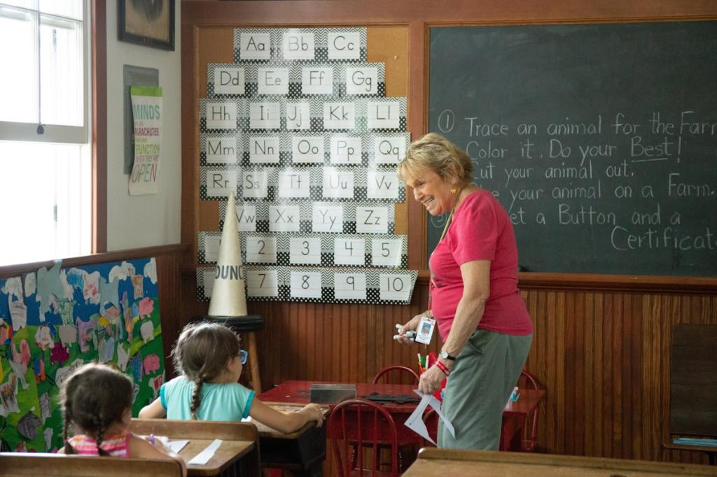 Children at a clean, bright preschool classroom