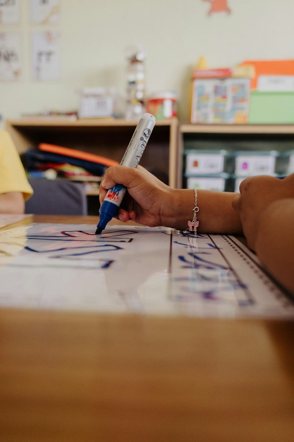 Children at a clean, bright preschool classroom