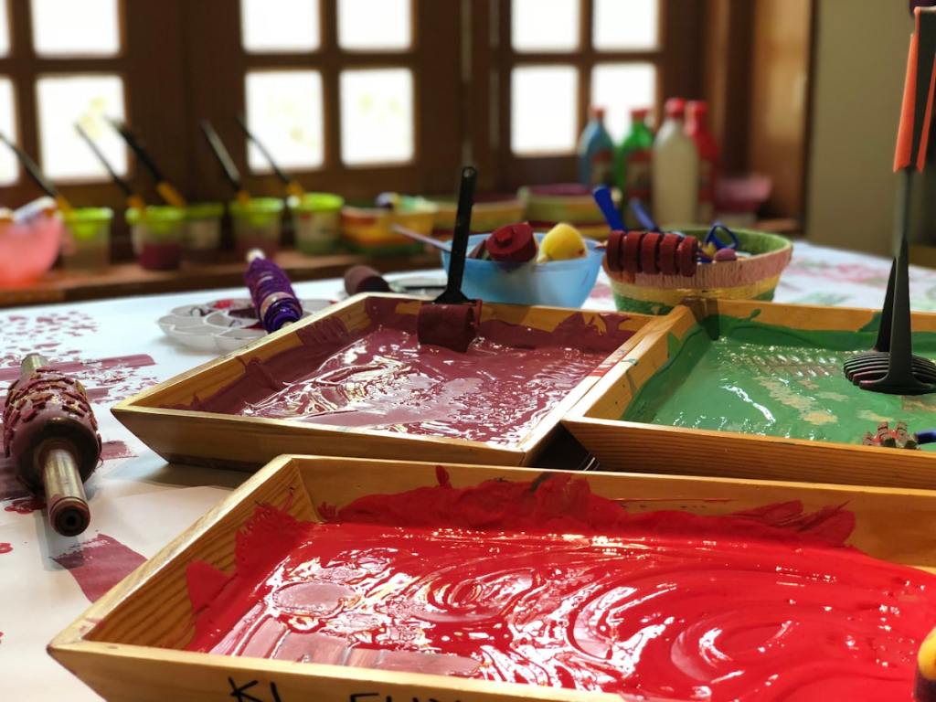 Children at a clean, bright preschool classroom